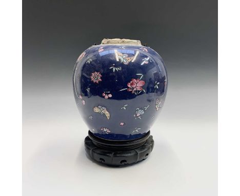 A large Chinese Canton blue ground ginger jar, 19th century, with painted enamel floral sprays and butterflies, height 25cm.C
