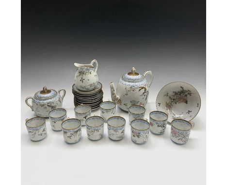 A Japanese porcelain tea service, early 20th century, comprising a teapot, sugar bowl, cream jug, footed bowl and eleven cups