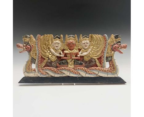 A Thai gilded carved wood panel, 22 x 51cm.