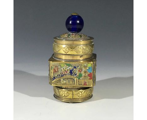 A Chinese brass and enamel jar, circa 1920, the cover surmounted by a peking blue glass finial, old inscribed sticker to unde