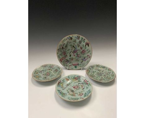 Four Chinese Canton celadon plates, circa 1900, each decorated with birds and butterflies amongst foliage, largest 19.5cm.Con