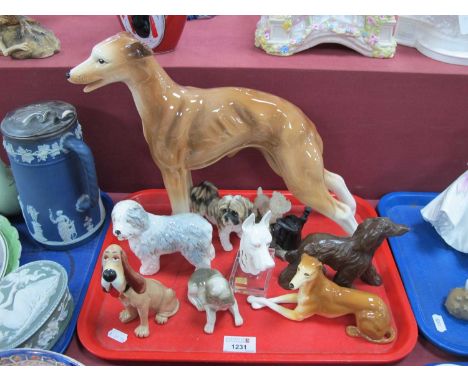 Wade Disney Blow Up 'Trusty the Hound Dog', 14cm high, Sylvac, large Melba and other dogs:- One Tray