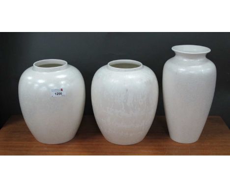 Poole Calypso Lustre Pottery Vases, with mottled decoration of white ovoid bodies. a pair 21cm high. A larger single slender 