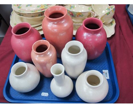 Poole Calypso Lustre Pottery Vases, with mottled decoration in white and tones of pink, the tallest 20cm. (8).