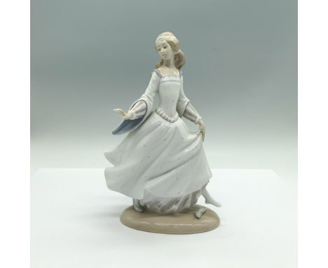 A glossy figure of a princess, dressed in a white gown and one of her slippers has fallen off. Lladro backstamp. This item ha