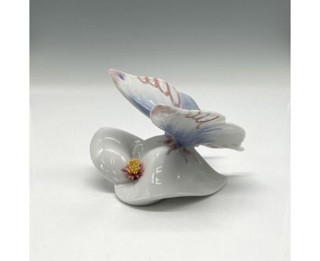 Lovely butterfly design sitting with small flower. Colored in blue, white, yellow and pale pink. Lladro backstamp. This item 