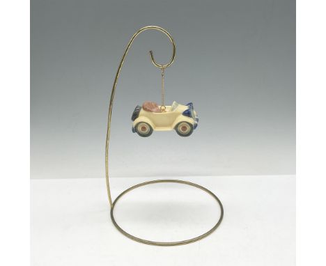 Glossy car with gold loop and chain on top. Lladro backstamp. This item has its original box: 4.5"L x 4.5"W x 3.5"H. Artist: 