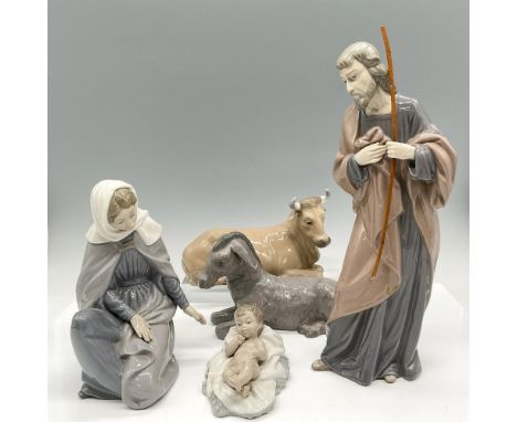 Glossy figurines including Mary 7"H, baby Jesus 2.5"H, Joseph standing with staff 11"H, donkey 4.5"H and cow 4.5"H. Colored i
