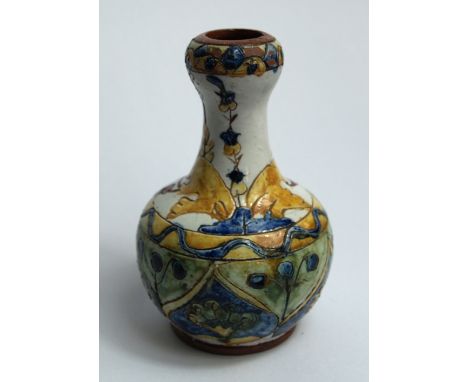 Carlo Manzoni "Minerva Art Ware" after Della Robbia, Birkenhead, a low-relief sgraffito decorated baluster vase with incised 