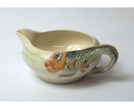 Clarice Cliff for Wilkinson Ltd., a sauce jug with raised fish incorporating the handle