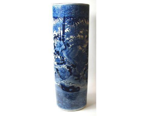 A 19th Century Chinese ceramic stick stand, blue over white decoration of excited cranes in busy undergrowth. Height approxim