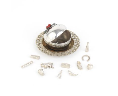 STUART DEVLIN: a silver, silver-gilt and enamelled novelty surprise Christmas puddingLondon 1974Domed mottled cover decorated