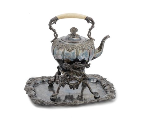 A late 19th century electroplated tea kettle and stand together with a similar trayall with fruiting vine leaf borders, the k