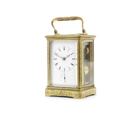 A late 19th century French gilt brass carriage clock with alarmthe movement stamped Japy Freresthe floral engraved Corniche c