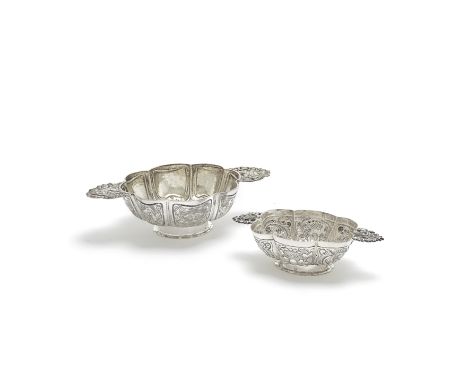 Two Dutch silver brandy bowlspseudo Dutch marks Oval lobed form the small example with import marks for London 1903, importer