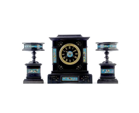 A late 19th century French black marble and champlevé enamel panel inset clock garniturein the aesthetic taste, the dial with