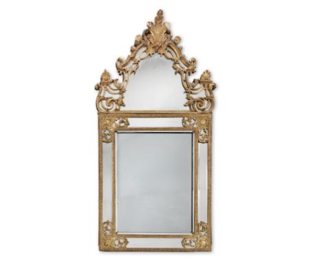 A Regence carved giltwood marginal mirrorthe large-scale cresting possibly associatedCirca 1720, the later bevelled plates wi