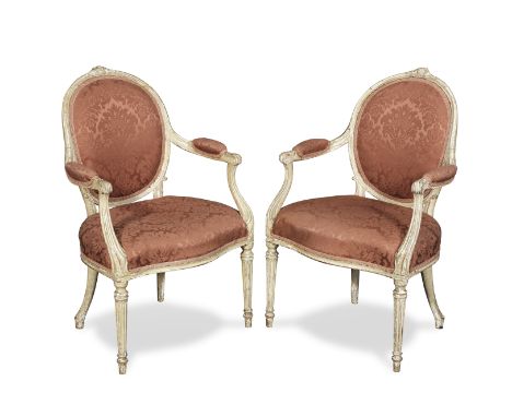 A pair of George III painted open armchairsin the manner of Thomas ChippendaleCirca 1775, each with channelled frames, the ov