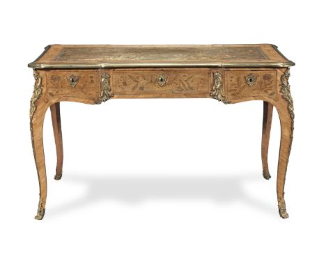 An early Victorian ormolu mounted tulipwood, walnut and marquetry writing table in the Louis XV stylealmost certainly origina