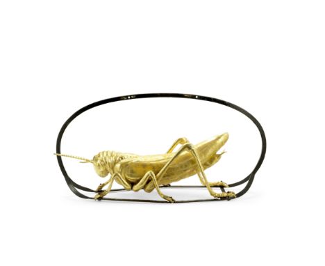An early 20th century gilt metal and wrought iron grasshopper 'shop' sign for the Grasshopper bankin the style of earlier tra
