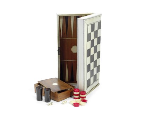 An early 19th century Anglo-Indian Vizagapatam ivory and horn inlaid folding chess and backgammon board / games box together 