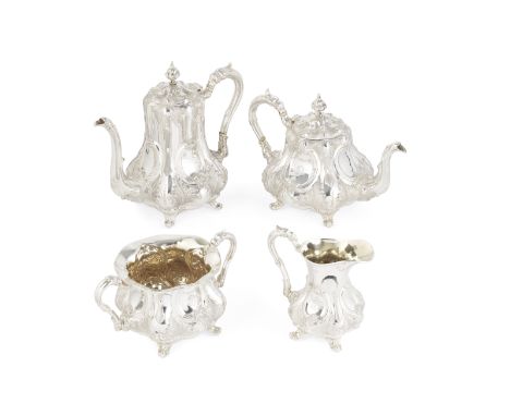 A Victorian silver four-piece tea and coffee service,Walker &amp; Hall, Sheffield 1899 Of compressed pear shape, with fluted 