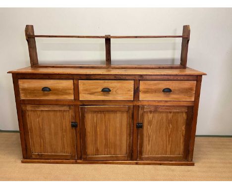 A pitch pine kitchen dresser base with three drawers over three cupboards and a shelf to the top, height 99cm, width 187cm, d