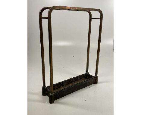 An early 20th century brass hall stick stand with original drip tray, height 56cm, width 46cm, depth 13cm