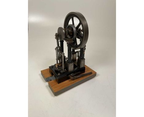 A scratch-built static engine raised on simple wooden base, height 33cm.