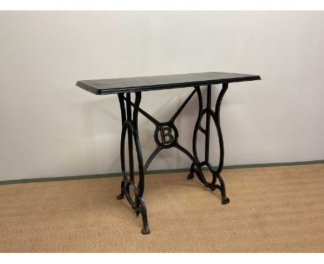 An Art Nouveau iron sewing table base converted to a hall table, height 74cm, width 92cm