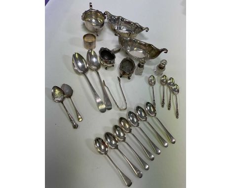 A group of mixed small silver including a pair of boat shaped small bowls, sauceboat, pair of open salts, pair of tablespoons