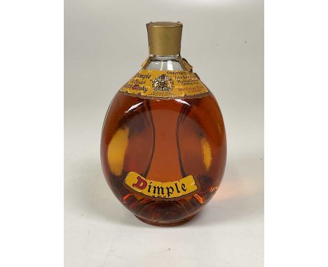 A litre bottle of Dimple Old Blended Scotch whisky, unopened and sealed.