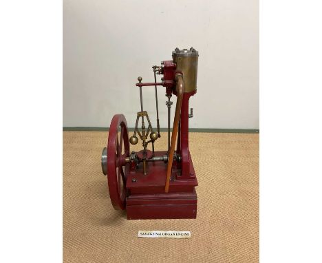 A large scratch-built static engine with six spoke side wheel and red painted main platform, height 64cm.