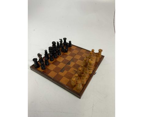 A vintage wooden chess set, height of king 8cm, (a/f)