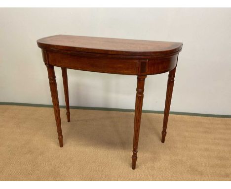 A George III satinwood cross banded demi-lune card table, height 74cm, width 91cm, depth 45cm (closed width)