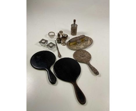 A small group of silver and white metal including a hand mirror, pepper, pair of glass salts, also two further hand mirrors, 