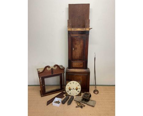 An oak longcase clock with hand painted dial. 200cm high, 56cm wide.