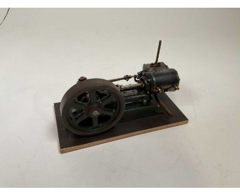 A scratch-built static engine raised on simple rectangular wooden plinth, length 22.5cm.