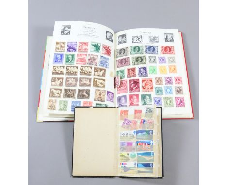 A Royal Mail boys stamp album and contents and another book containing stamps.