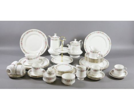 A Paragon tea/dinner service decorated in the Belinda pattern (approximately forty six pieces).