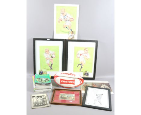 A collection of sporting memorabilia to include signed rugby and cricket prints along with a ball and various programmes.