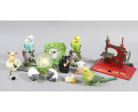 A vintage little Betty tin plate sewing machine and collection of ornaments.
