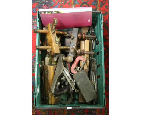 A box of tools to include Stanley Wood plane, hand drill, micrometer rebate planes, tennon saws etc and a fold of the Woodwor