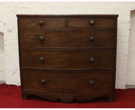 A C19th mahogany bow fronted two over three graduated chest of drawers raised on bracket feet.