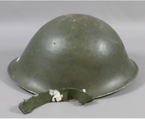 A metal military helmet.