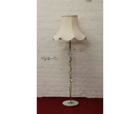 An onyx based standard lamp and shade.