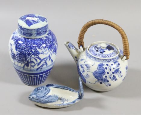A Japanese Arita bone dish modelled in the form of a fish, an Arita jar and cover and a similar Chinese blue and white kettle