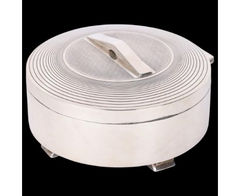 An Art Deco George VI silver box, S Blanckensee & Sons Ltd, Birmingham 1938, circular form with geometric pyramid handle, eng