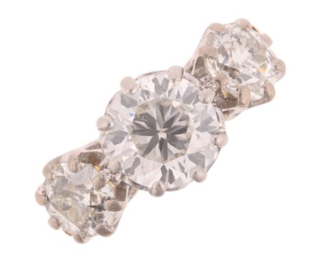 An 18ct gold three stone diamond ring, claw set with old European-cut diamonds, total diamond content approx 2ct, principal d