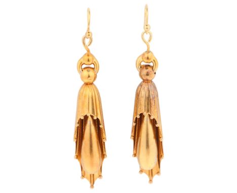 A pair of Antique Victorian 21ct gold Etruscan Revival drop earrings, circa 1880, each designed with a central torpedo drop s